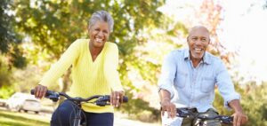 Mature couple enjoying a bike ride